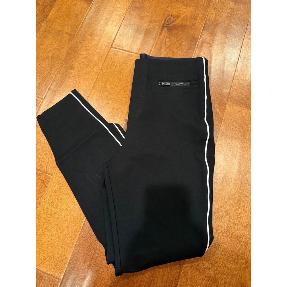 Spanx size large leggings/pants with zipper pockets and white piping